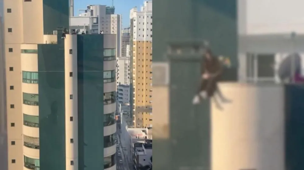 Adolescente arrisca a vida sentada no topo de prédio em Balneário Camboriú