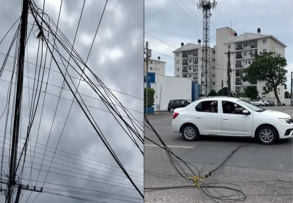 Caminhão que carregava lancha de passeio arrasta e arrebenta fiações elétricas, de telefonia e de internet no Centro de Penha